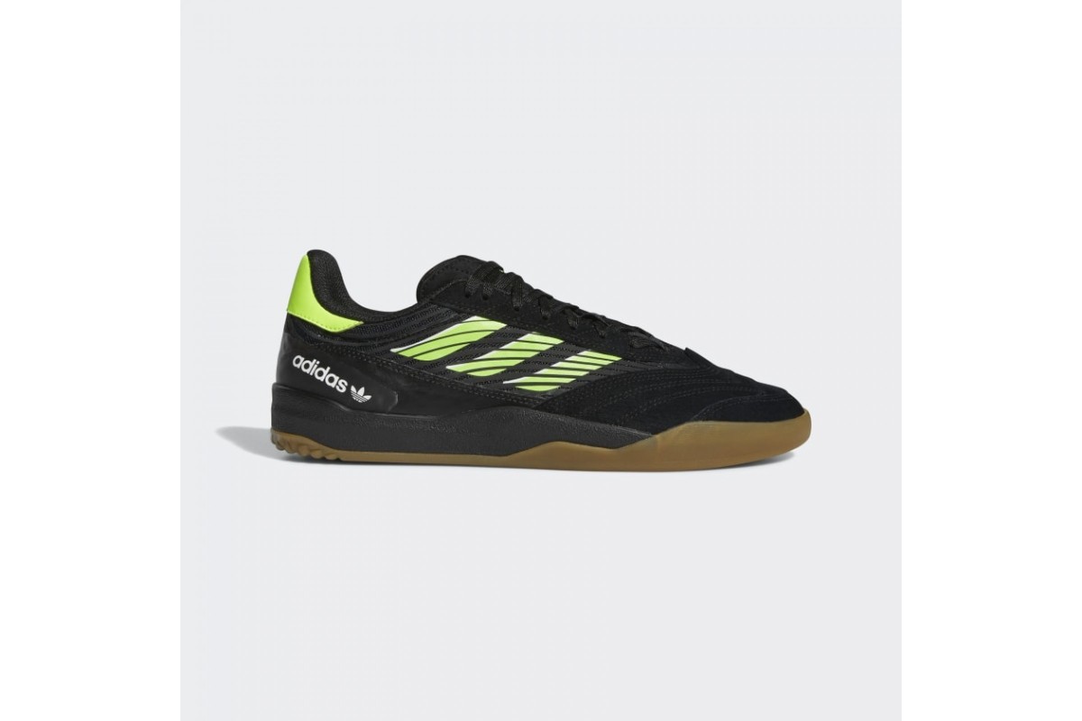 adidas Copa Nationale Black / Signal Green / Gum The Copa Nationale Shoes  instantly became a standout for their tech-forward features and modern  design. This version injects even more eye-catching detail with